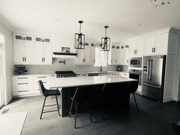 Denron Kitchen Designs Inc