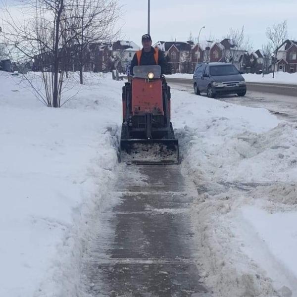 Two Bitt's Mini Skidsteer Service