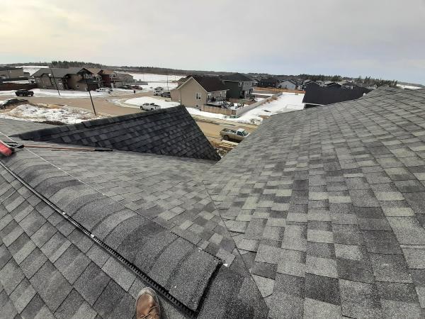 The Roofer Inc